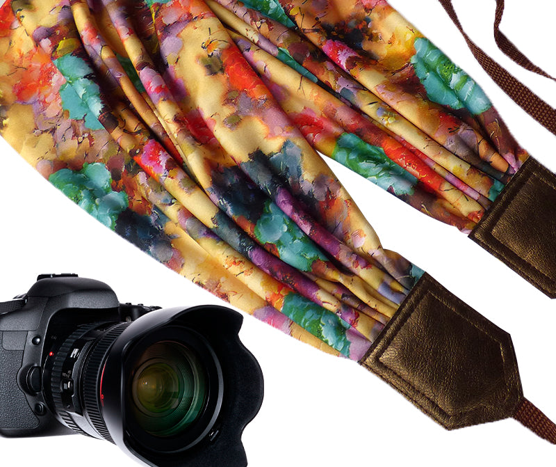 Scarf Camera Strap with colorful flowers design and golden ends.