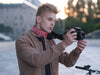 Personalized camera strap for tourists with London and UK symbols.