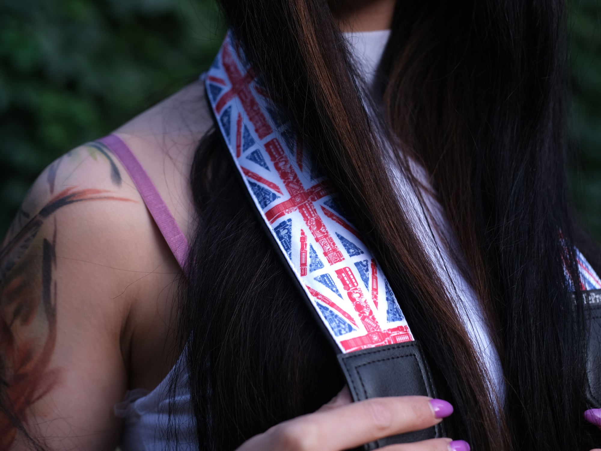 Personalized camera strap for photographers and travelers with Great Britain flags.