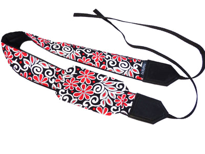 Padded camera strap with red and white flowers for DSLR SLR and mirrorless cameras.